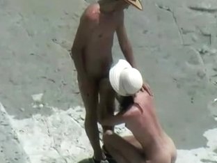 Bare Beachgoers Caught Fucking On Cam