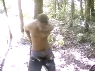 BG Tied to a tree and exposed.