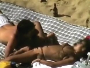 Voyeur Tapes A Couple Having Sex On A Nude Beach