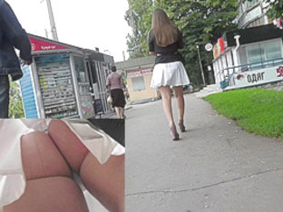 Young coquette was filmed on the upskirt hidden camera