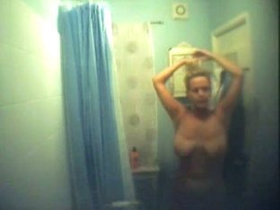 Big Breasted Blonde Captured On A Shower Spy Cam