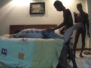 Tatooed daddy and two black twins