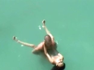 Couple fucking in sea