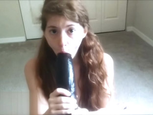 Tiny Redhead Teen Sucks Massive Black Dildo