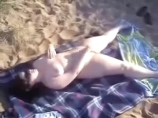 Horny Slut At Beach Masturbating For Voyeurs