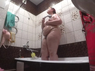 Lesbian Has Installed A Hidden Camera In The Bathroom At His Girlfriend. Peeping Behind A BBW With.