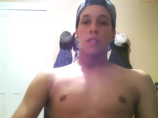 Mixed race cutie jerks his dick and foot teases