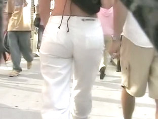 Gorgeous round ass in semi-transparent pants