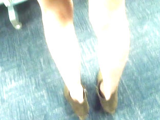Slim Blonde Milf Upskirted In The Library