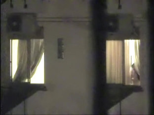 Naked Bimbo At The Window Spied On Cam By The Neighbor