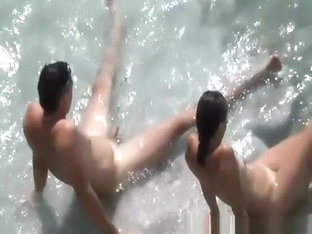 Nudist Couple In The Water