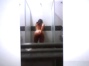 Hot Brunette Fingering While Showering