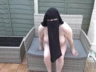 In Strappy High Heels Wearing Only Niqab Outdoors