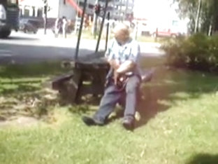 Old man jerks in the park