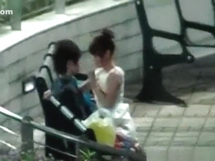 Voyeur Tapes An Asian Girl Couple Having Sex On A Bench In The Park