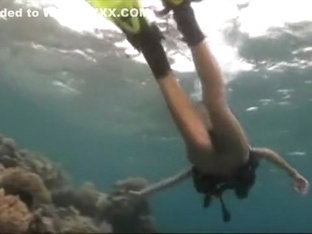 Naked Scuba Dive