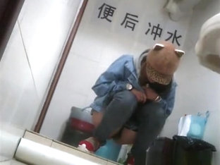Asian Girl With Funny Hat Peeing