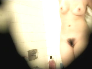 Sweet hairy pussy peeped in a shower