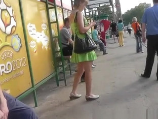 Blonde teen in short green dress upskirt