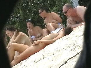 four naked beauties on the beach mucking about bollock naked