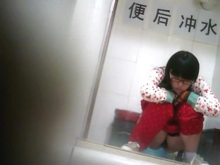 Geeky Chinese Girl Spied While Pissing