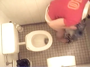 Naked Girl Is Pissing On The Hidden Cam In The Toilet