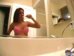 Kat Shows Her Playful Tits In The Bathroom