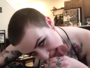 420 Tattooed Babe Smokes While Sucking Cock